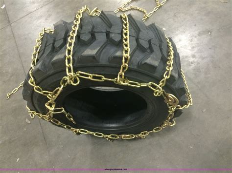 skid steer tire chains vs tracks|12x16.5 skid steer tire chains.